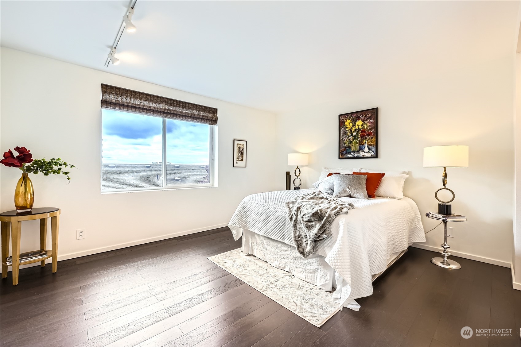 619 5th Avenue West, Unit 401 Seattle, WA 98119 - Photo 12 of 29 a bedroom with bed and a window