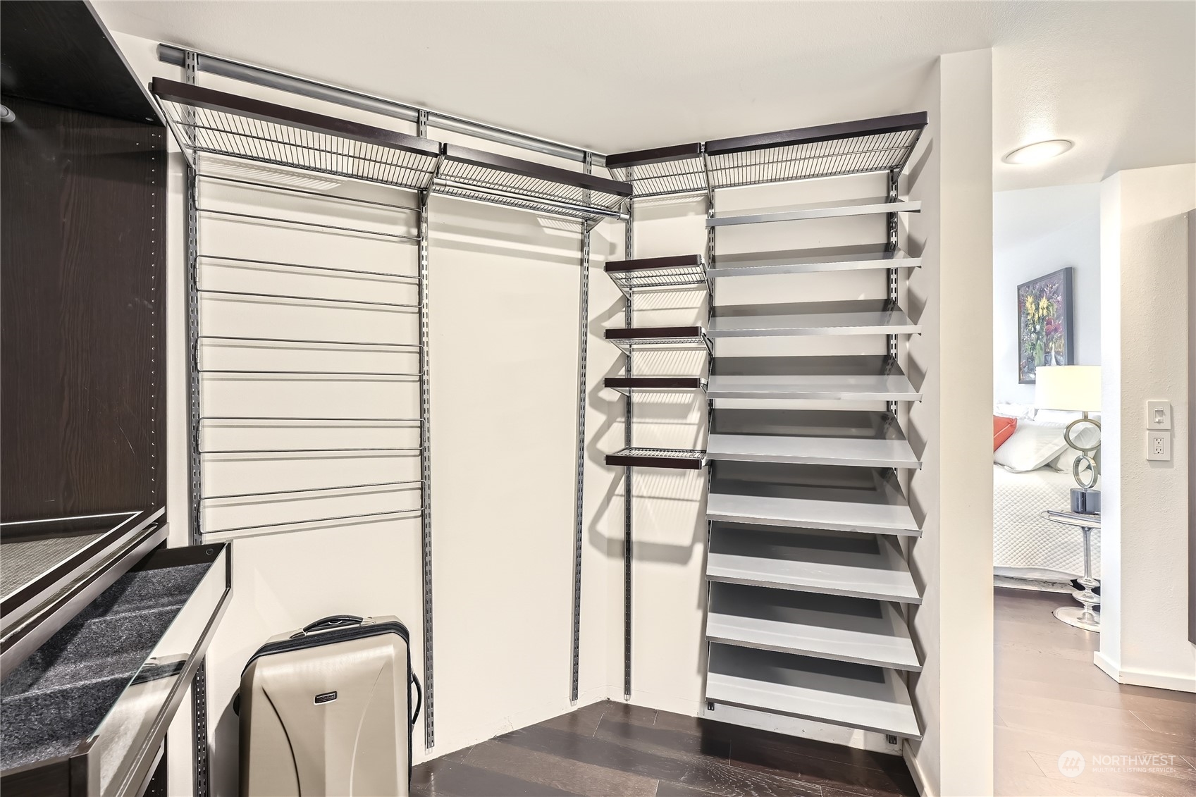 619 5th Avenue West, Unit 401 Seattle, WA 98119 - Photo 17 of 29 a view of walk in closet with empty racks