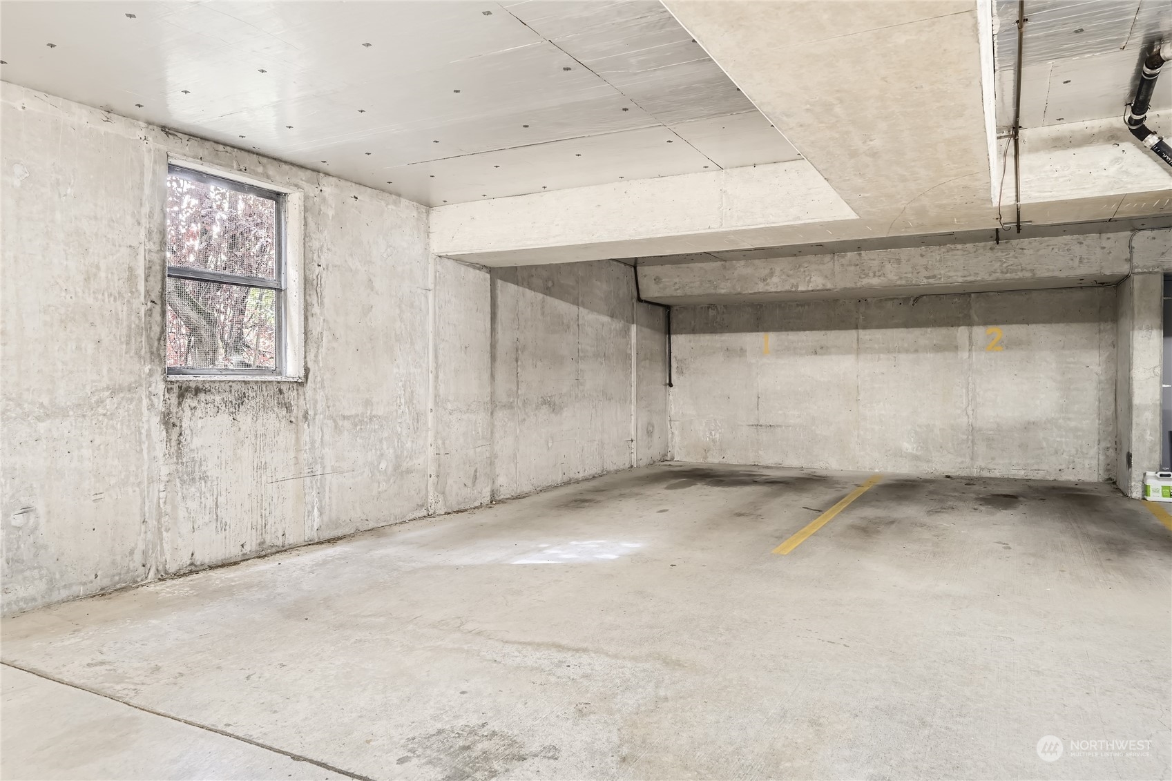 619 5th Avenue West, Unit 401 Seattle, WA 98119 - Photo 25 of 29 a view of a garage