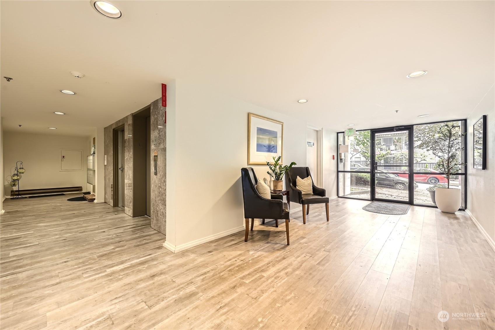 619 5th Avenue West, Unit 401 Seattle, WA 98119 - Photo 26 of 29 a view of a livingroom with furniture and wooden floor