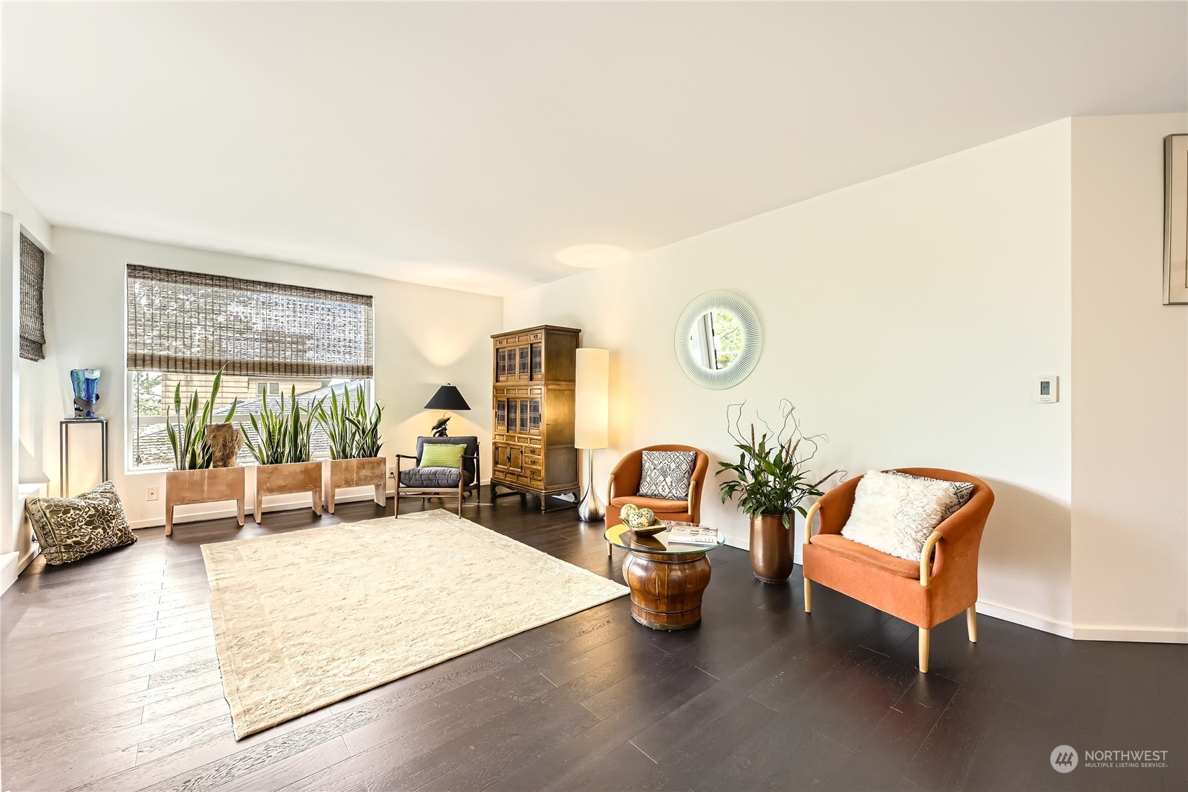 619 5th Avenue West, Unit 401 Seattle, WA 98119 - Photo 3 of 29 a living room with furniture and a table