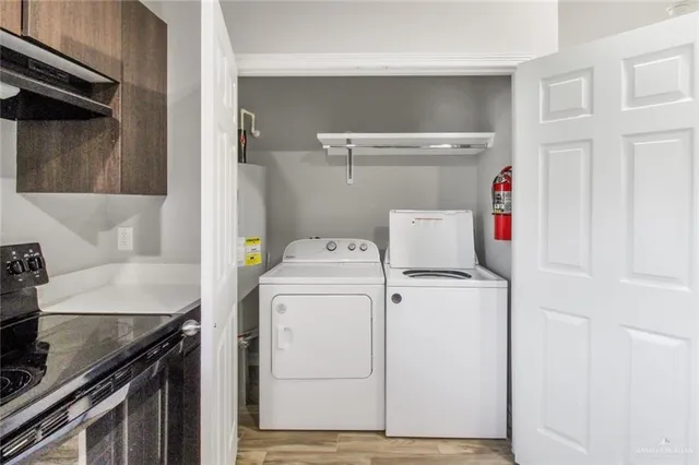a utility room with dryer and washer
