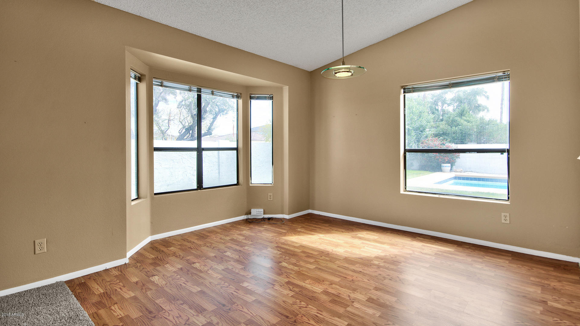 301 West Grandview Road Phoenix, AZ 85023 - Photo 3 of 15 a view of an empty room with a window