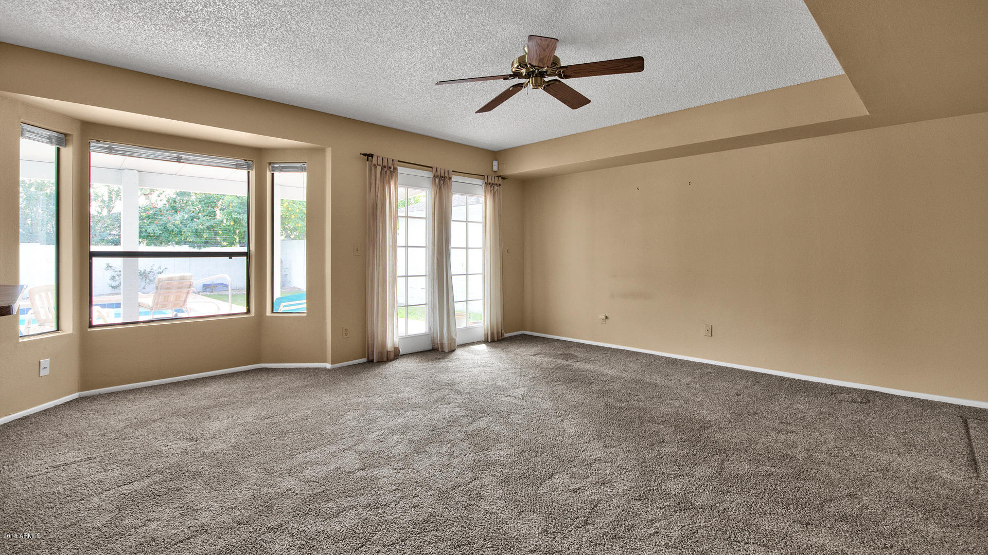 301 West Grandview Road Phoenix, AZ 85023 - Photo 6 of 15 a view of an empty room with a window