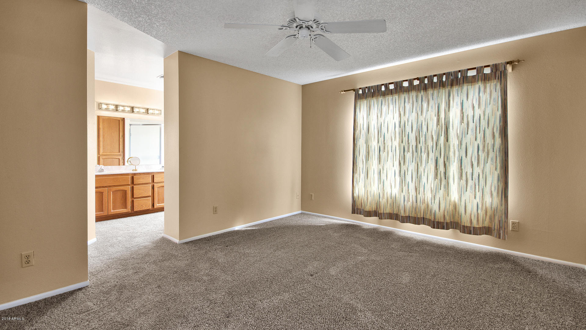 301 West Grandview Road Phoenix, AZ 85023 - Photo 8 of 15 an empty room with windows and closet
