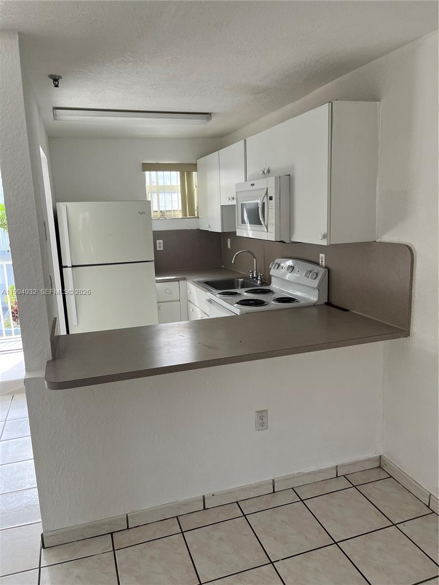 8031 Northwest 8th Street, Unit 13 Miami, FL 33126 - Photo 6 of 20