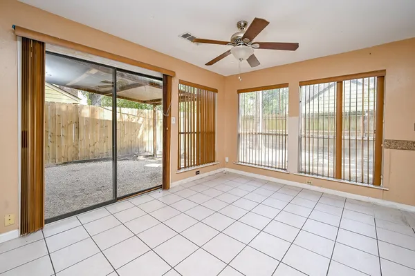 a view of an empty room and window