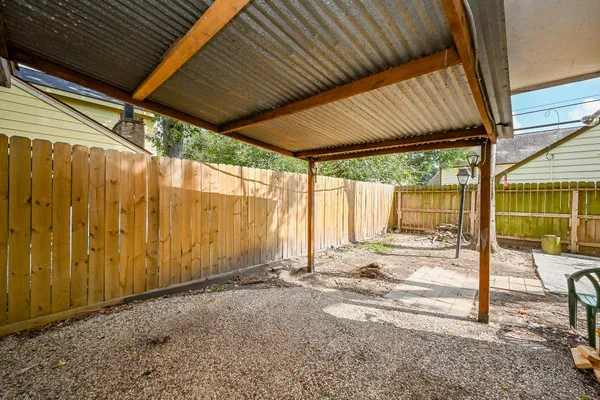 a view of a backyard with a garden
