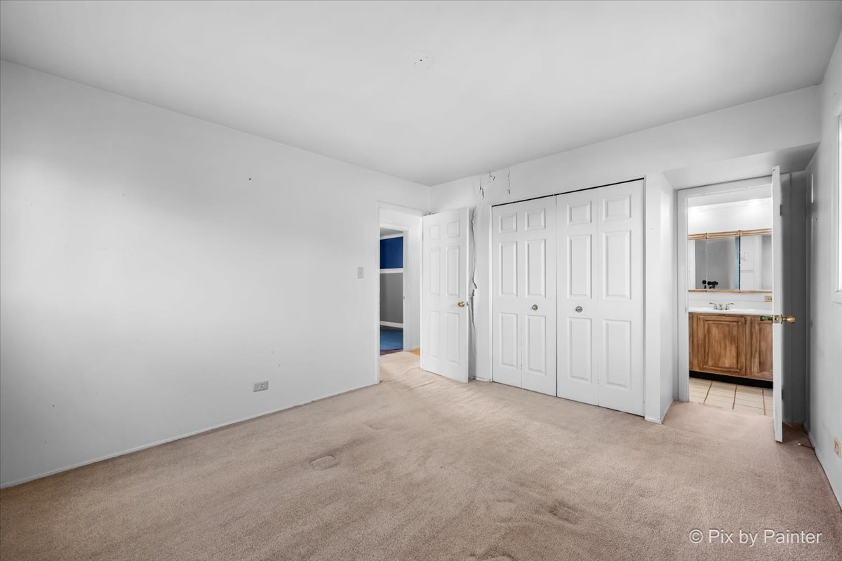 500 Colgate Court Hoffman Estates, IL 60169 - Photo 14 of 28 a view of an empty room and a window