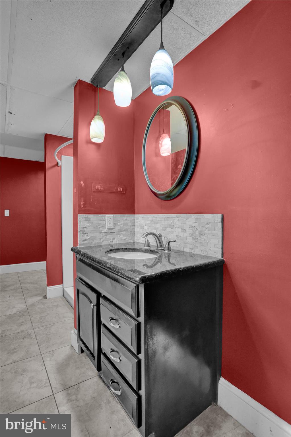320 South Baumstown Road Birdsboro, PA 19508 - Photo 12 of 43 a bathroom with a granite countertop sink and a mirror