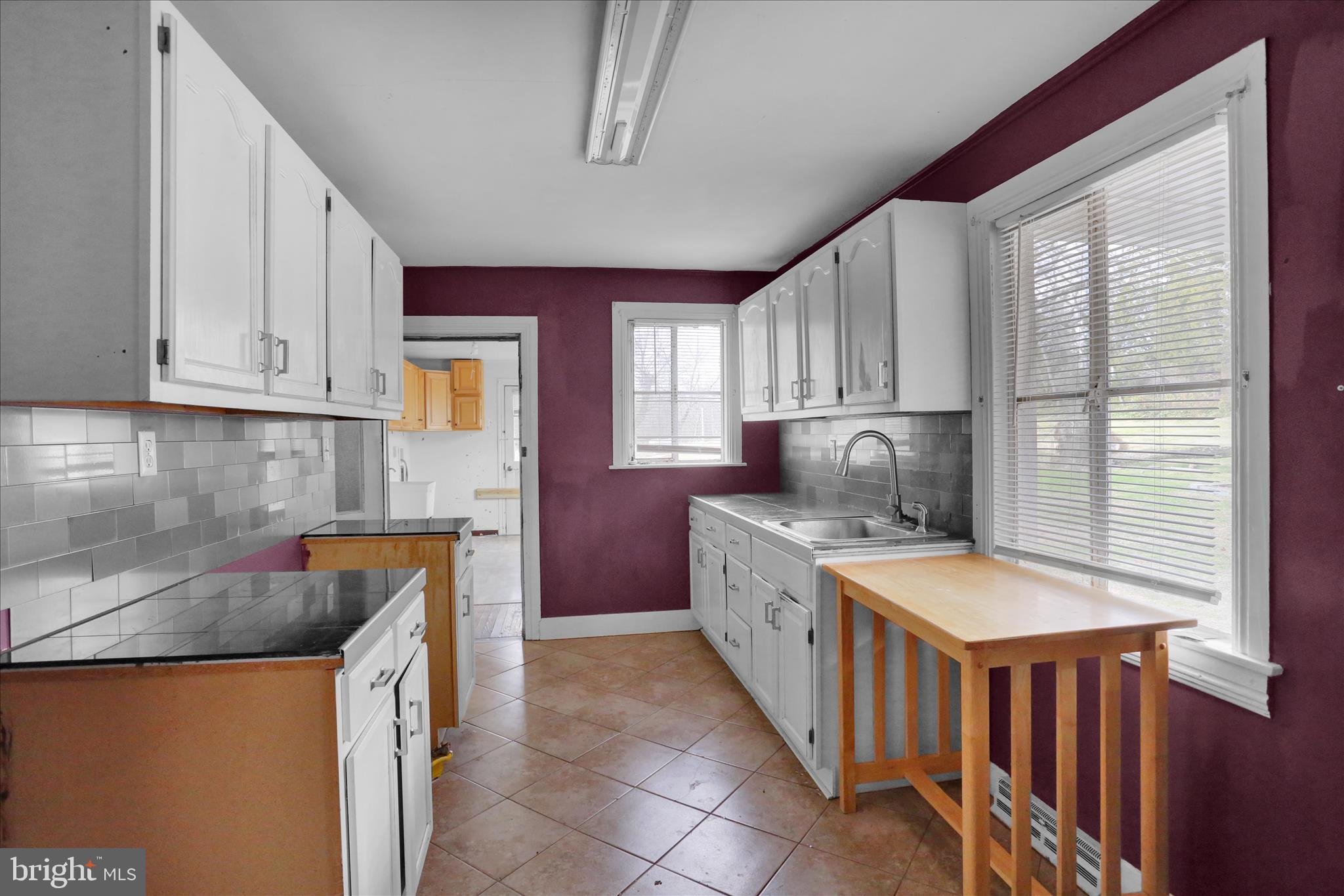 320 South Baumstown Road Birdsboro, PA 19508 - Photo 16 of 43 a kitchen with stainless steel appliances granite countertop a stove a sink and a refrigerator