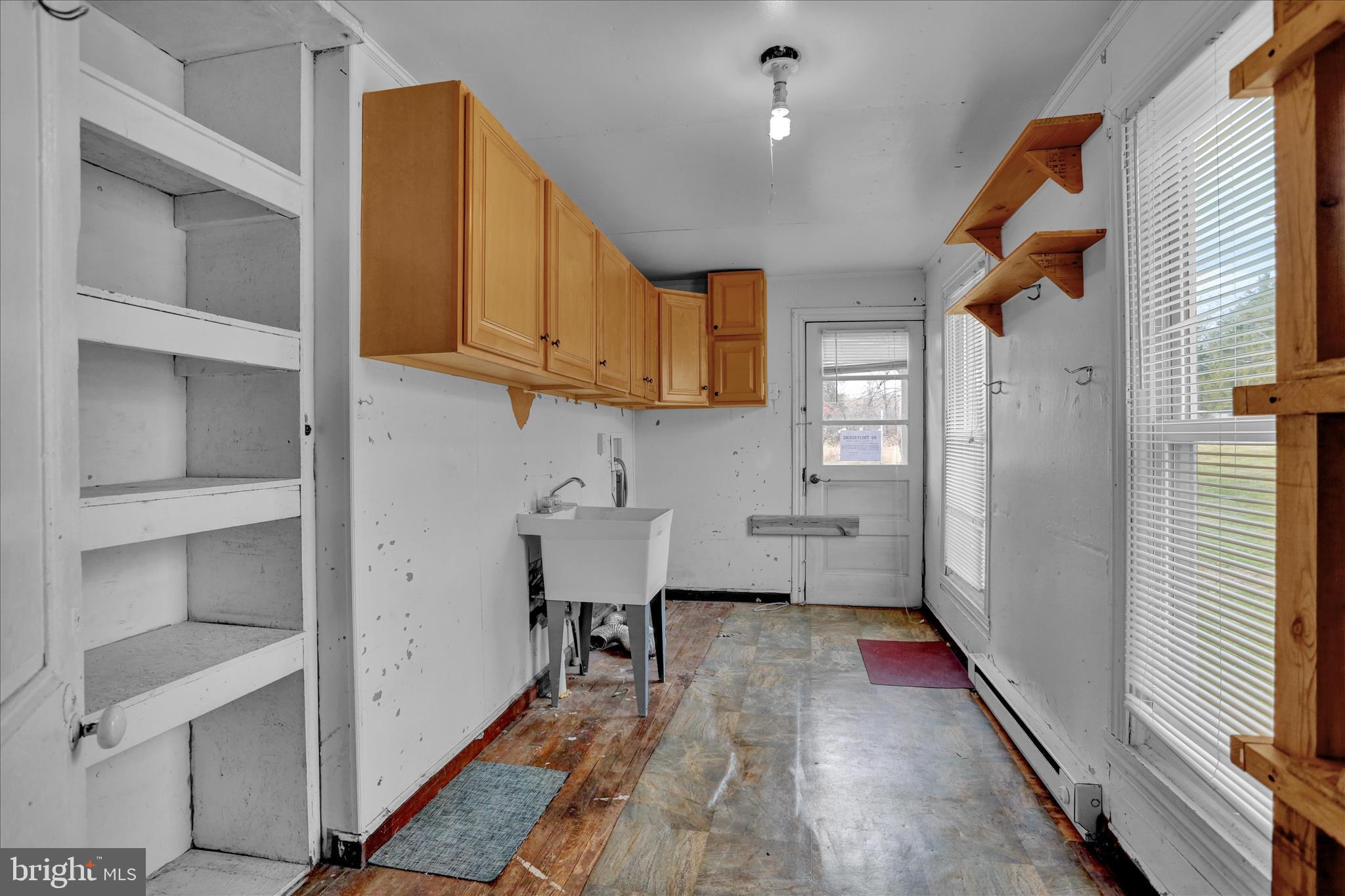 320 South Baumstown Road Birdsboro, PA 19508 - Photo 17 of 43 a view of a kitchen with wooden floor and cabinets