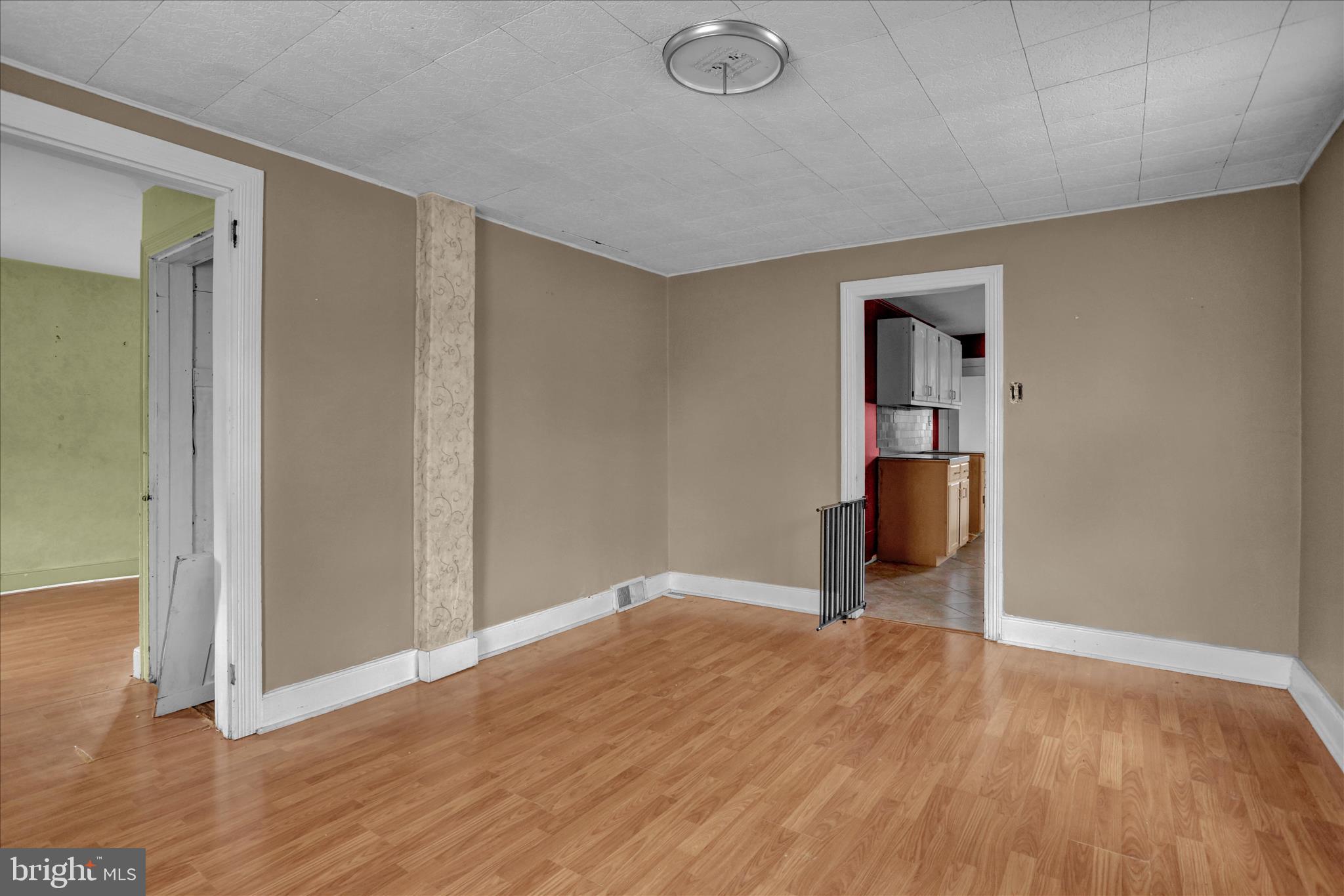 320 South Baumstown Road Birdsboro, PA 19508 - Photo 4 of 43 an empty room with wooden floor and windows