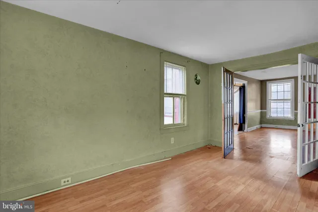 an empty room with windows