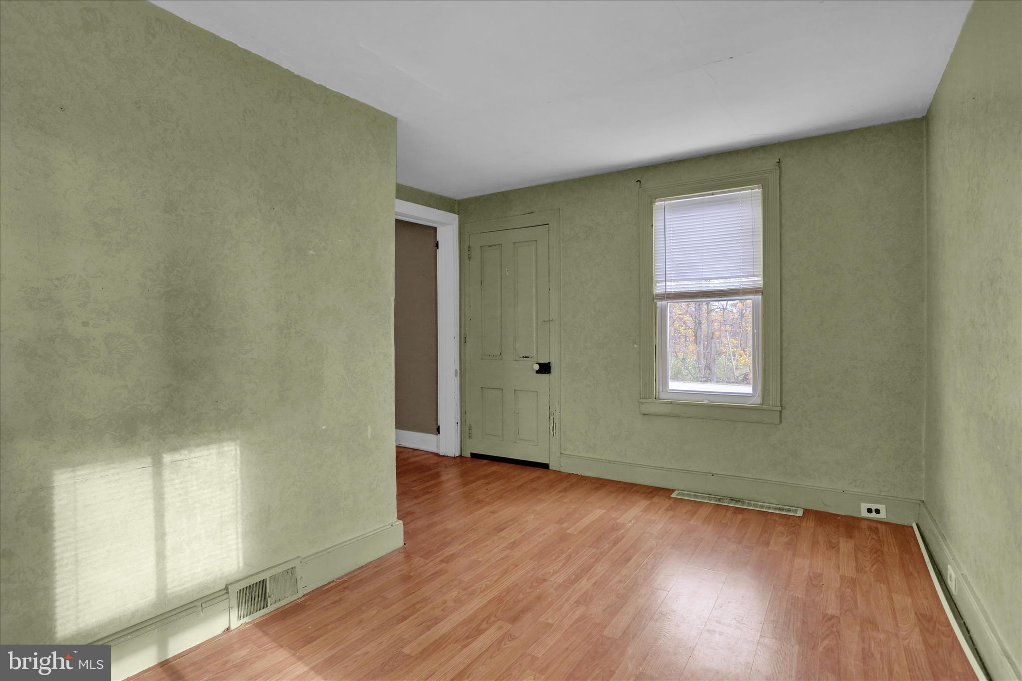 320 South Baumstown Road Birdsboro, PA 19508 - Photo 6 of 43 an empty room with wooden floor and windows