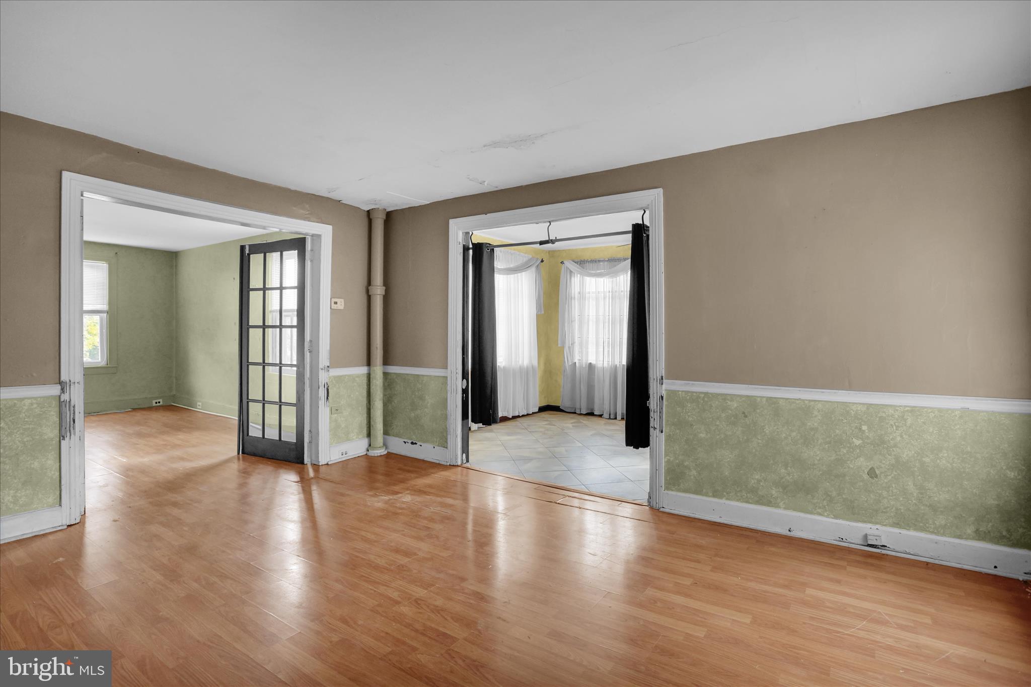 320 South Baumstown Road Birdsboro, PA 19508 - Photo 8 of 43 an empty room with wooden floor and mirror