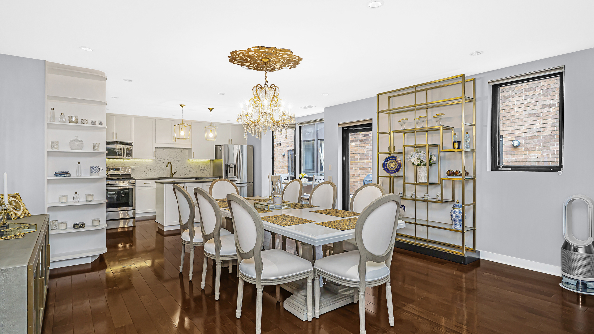 222 South Racine Avenue, Unit 404 Chicago, IL 60607 - Photo 12 of 36 a view of a dining room with furniture and wooden floor