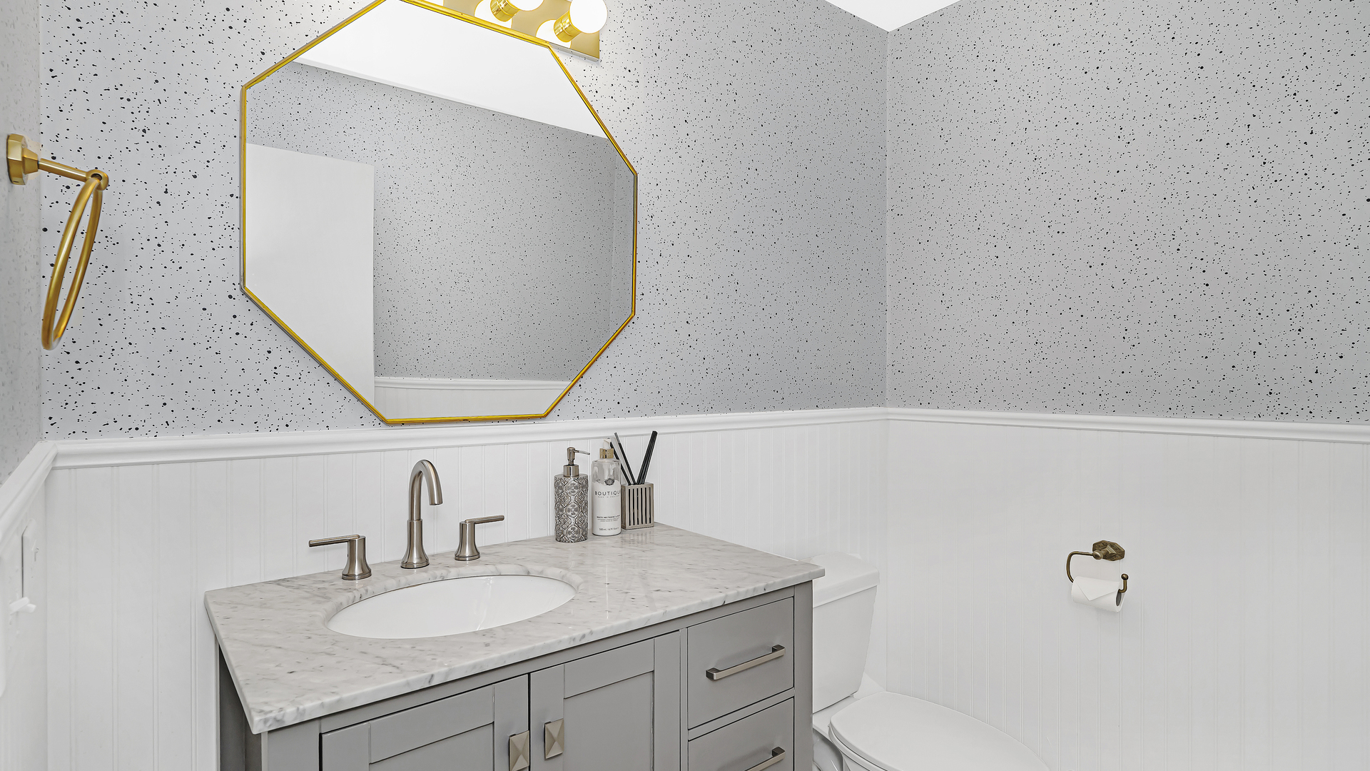 222 South Racine Avenue, Unit 404 Chicago, IL 60607 - Photo 4 of 36 a bathroom with a sink and a mirror