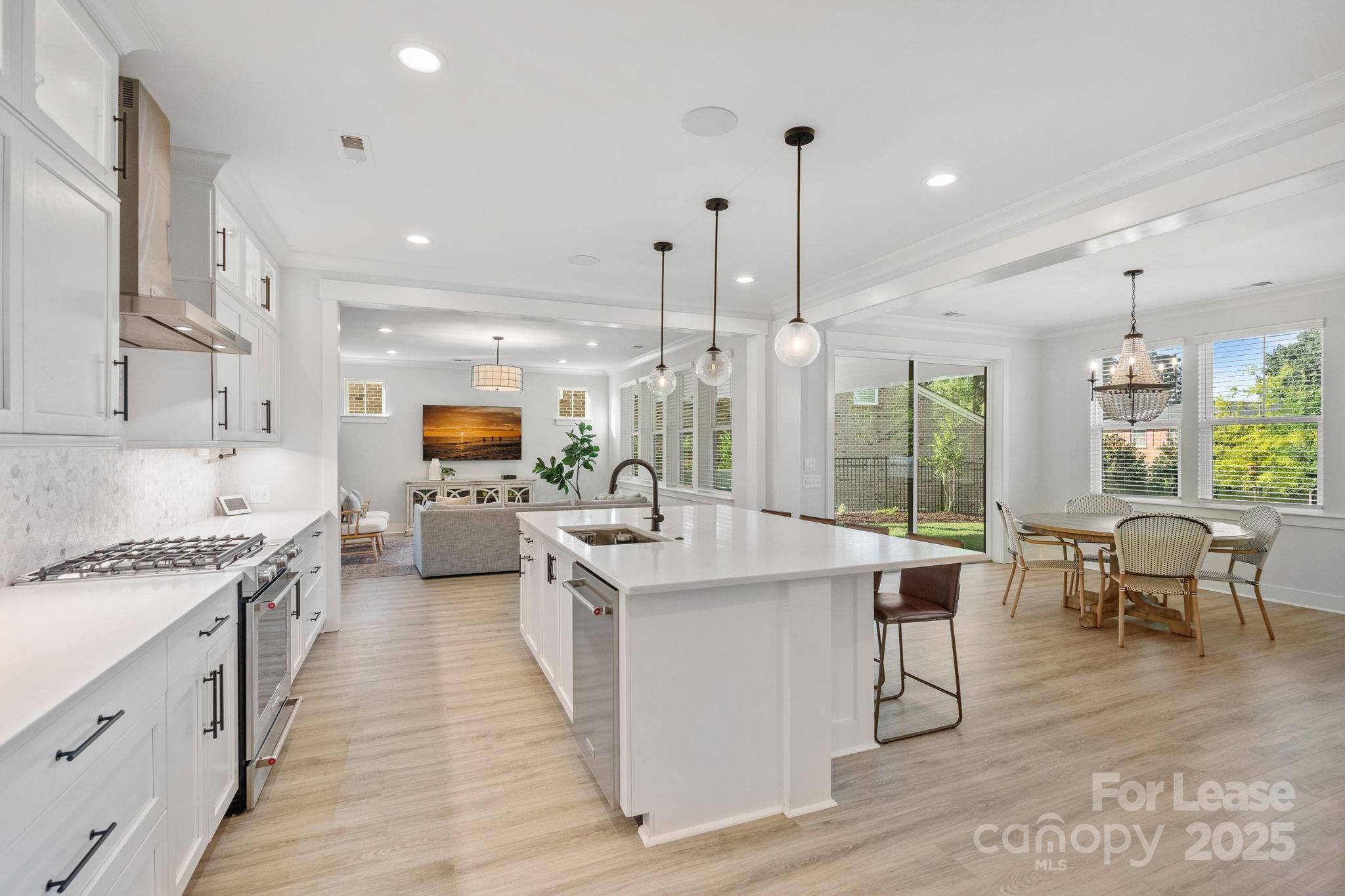 12012 Huntson Reserve Road Huntersville, NC 28078 - Photo 13 of 36 a large kitchen with stainless steel appliances lots of counter top space