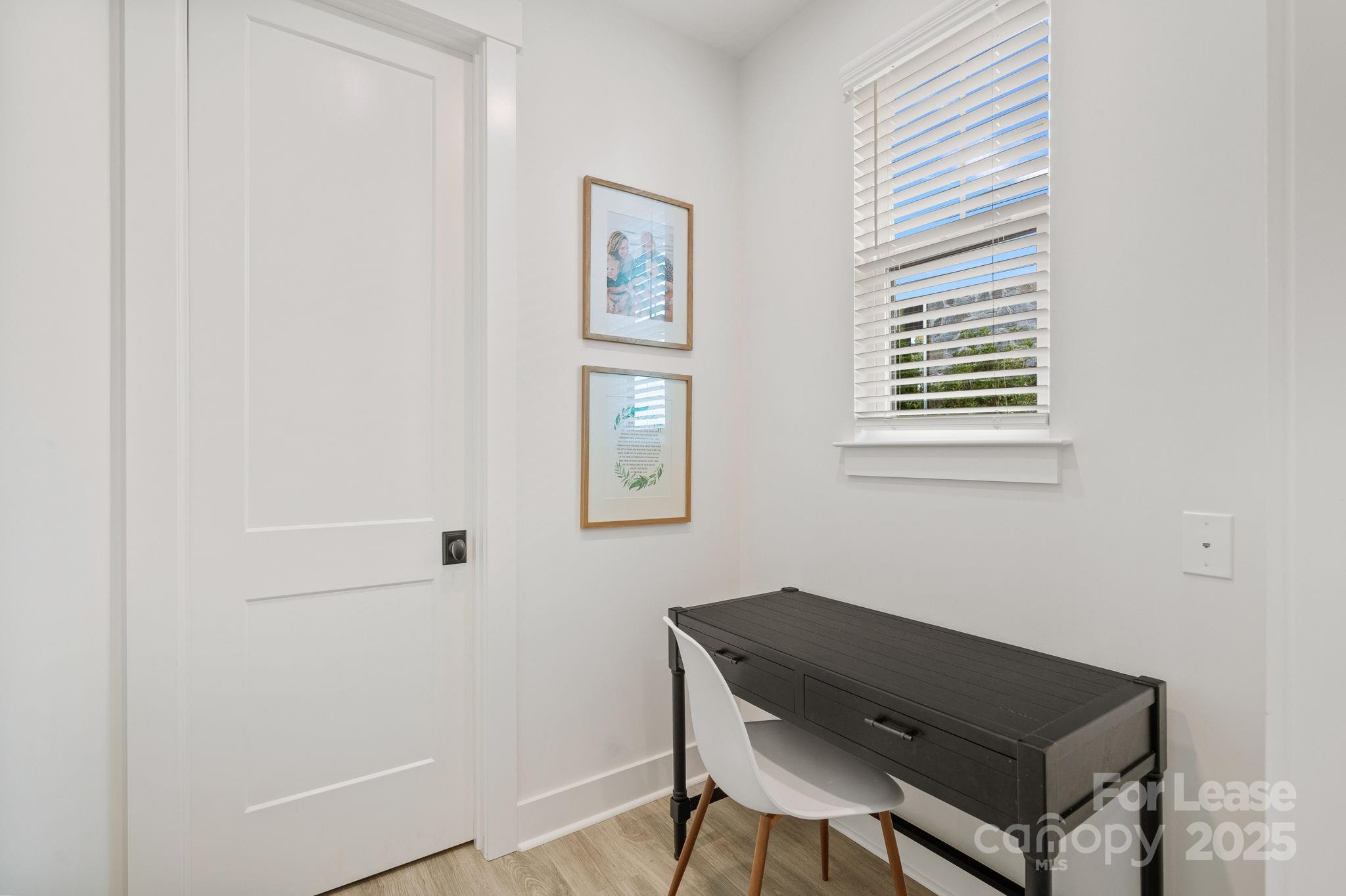12012 Huntson Reserve Road Huntersville, NC 28078 - Photo 16 of 36 a room that has a window and a chair in it