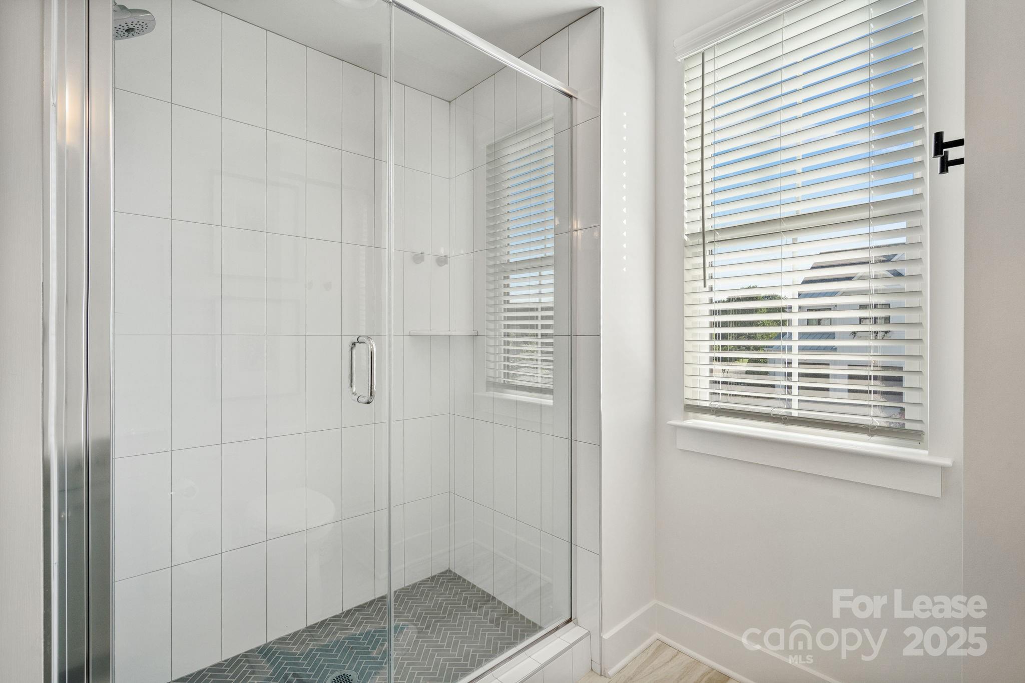 12012 Huntson Reserve Road Huntersville, NC 28078 - Photo 25 of 36 a bathroom with a window
