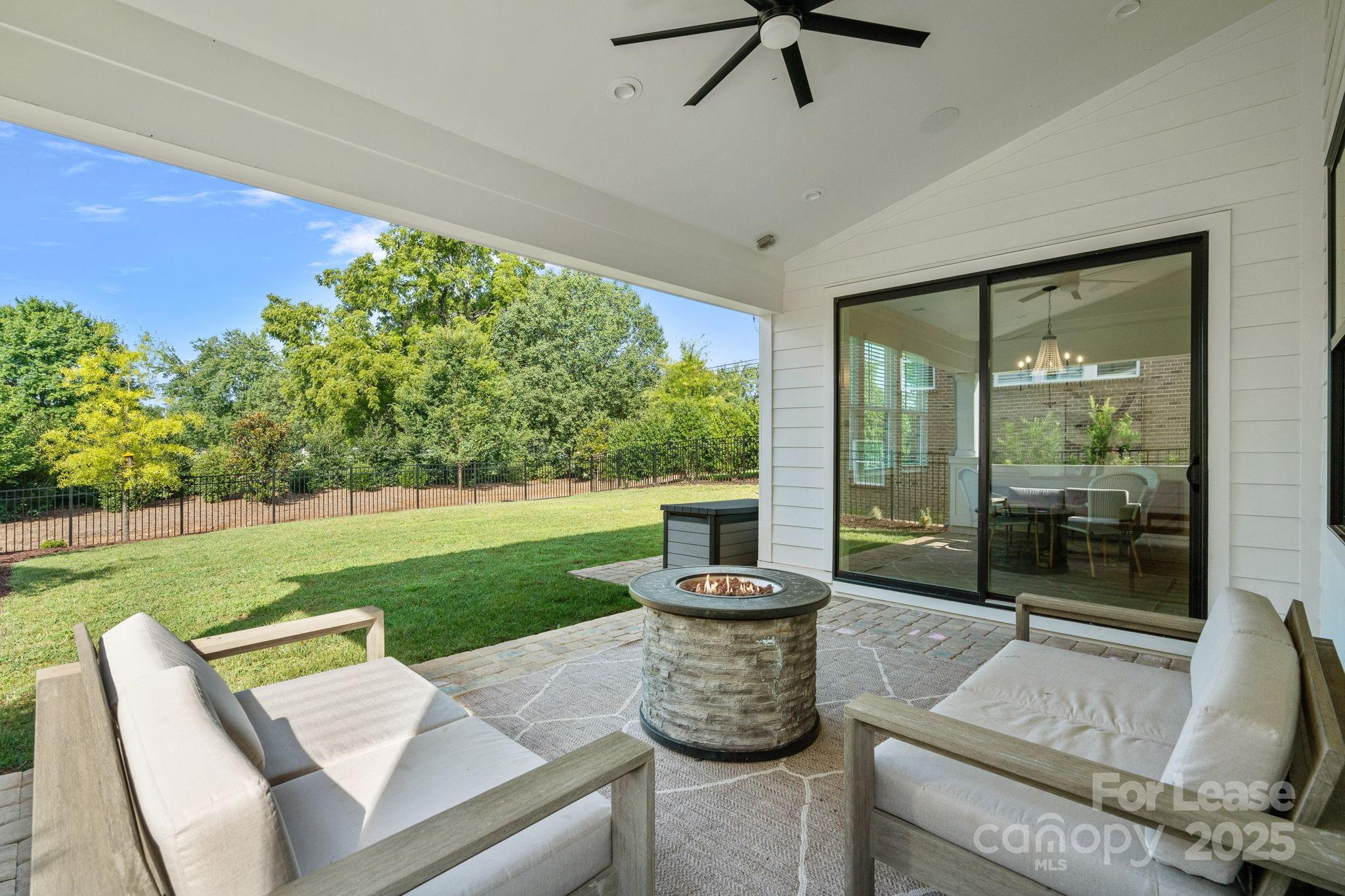 12012 Huntson Reserve Road Huntersville, NC 28078 - Photo 31 of 36 a living room with furniture and a yard