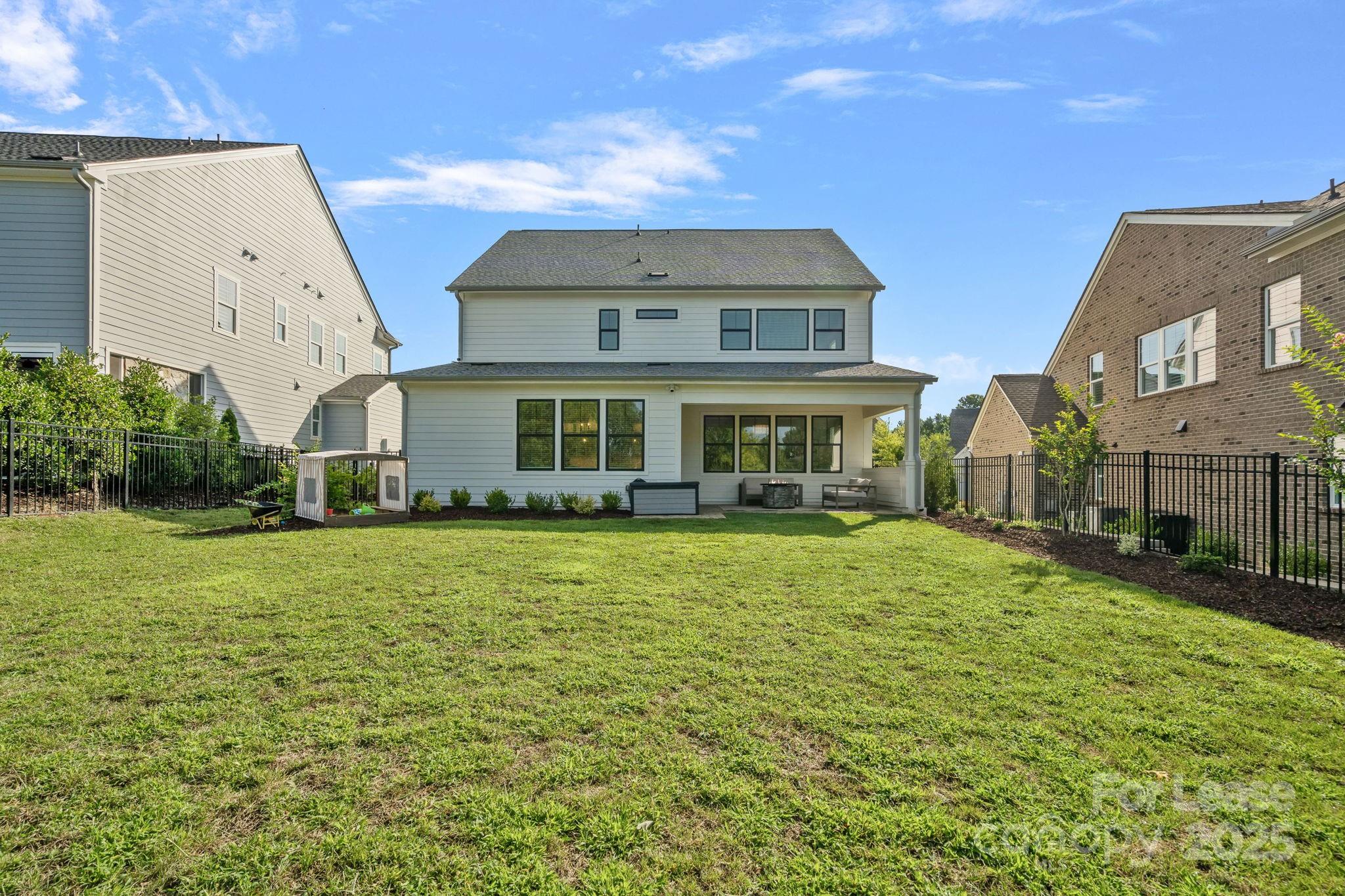 12012 Huntson Reserve Road Huntersville, NC 28078 - Photo 33 of 36 a front view of a house with a garden