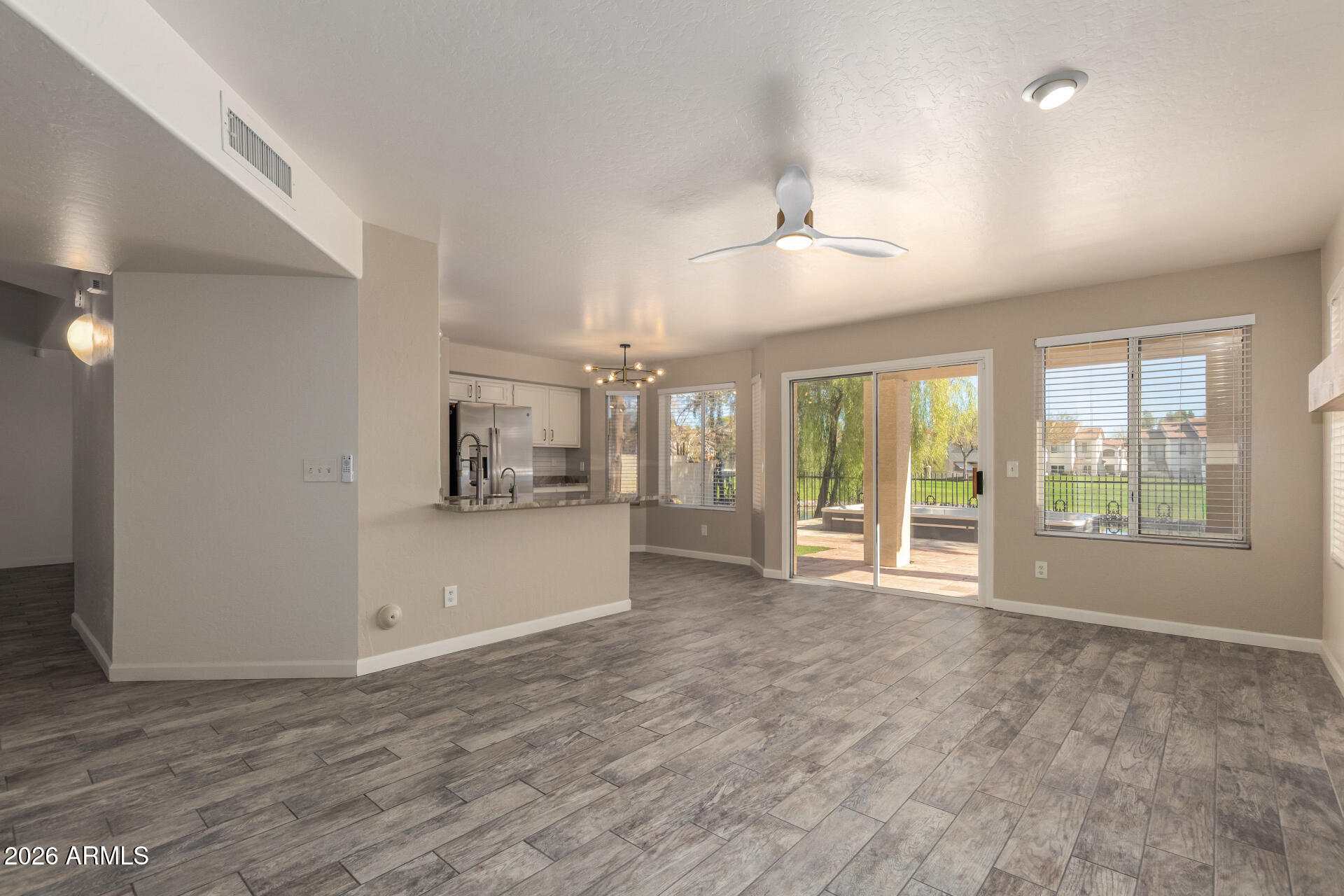 9641 South 51st Street Phoenix, AZ 85044 - Photo 11 of 28 Family Room/Kitchen