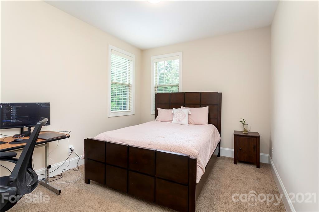 2522 Walker Road Matthews, NC 28105 - Photo 12 of 37 a bedroom with a bed and a window