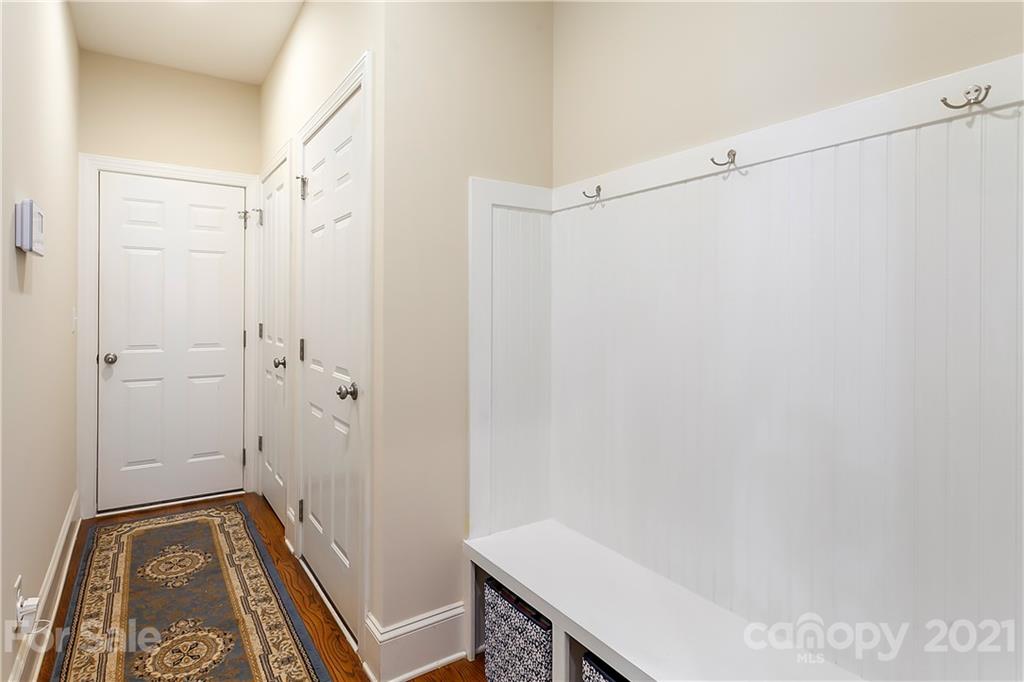 2522 Walker Road Matthews, NC 28105 - Photo 16 of 37 a view of room with walk in closet and wooden floor