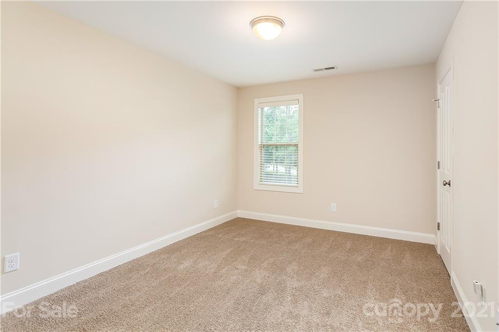 2522 Walker Road Matthews, NC 28105 - Photo 32 of 37 an empty room with windows