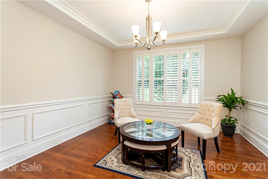 2522 Walker Road Matthews, NC 28105 - Photo 6 of 37 a living room with a couch and a table