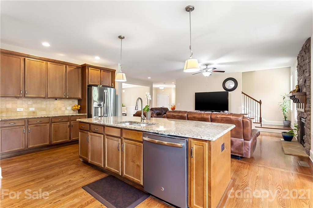 2522 Walker Road Matthews, NC 28105 - Photo 7 of 37 a kitchen with a sink appliances and cabinets