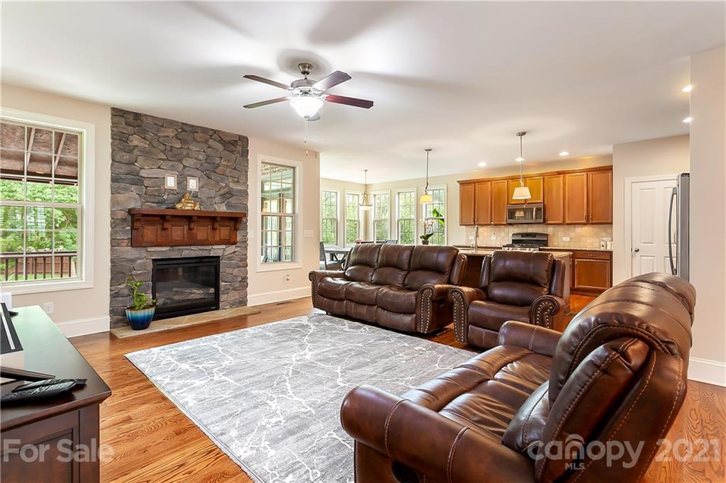 2522 Walker Road Matthews, NC 28105 - Photo 10 of 37 a living room with furniture and a fireplace