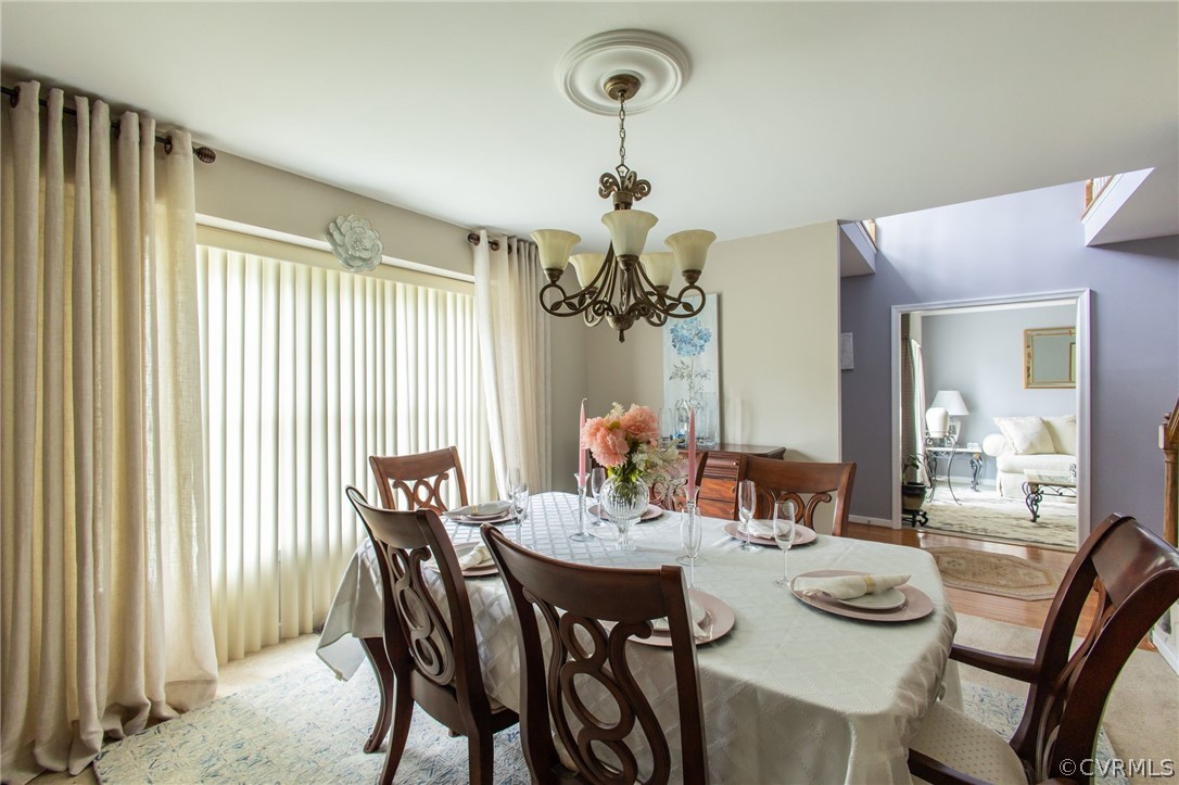 5169 Hackney Road North Chesterfield, VA 23234 - Photo 8 of 29 a view of a dining room with furniture and window