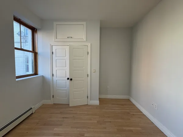 an empty room with windows