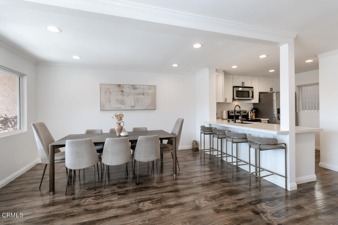 a view of a dining room with furniture
