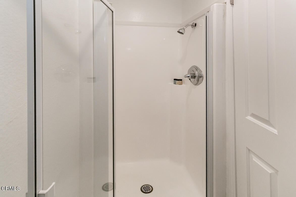 2940 North Verdugo Road, Unit 309 Glendale, CA 91208 - Photo 12 of 26 a bathroom with a glass shower door