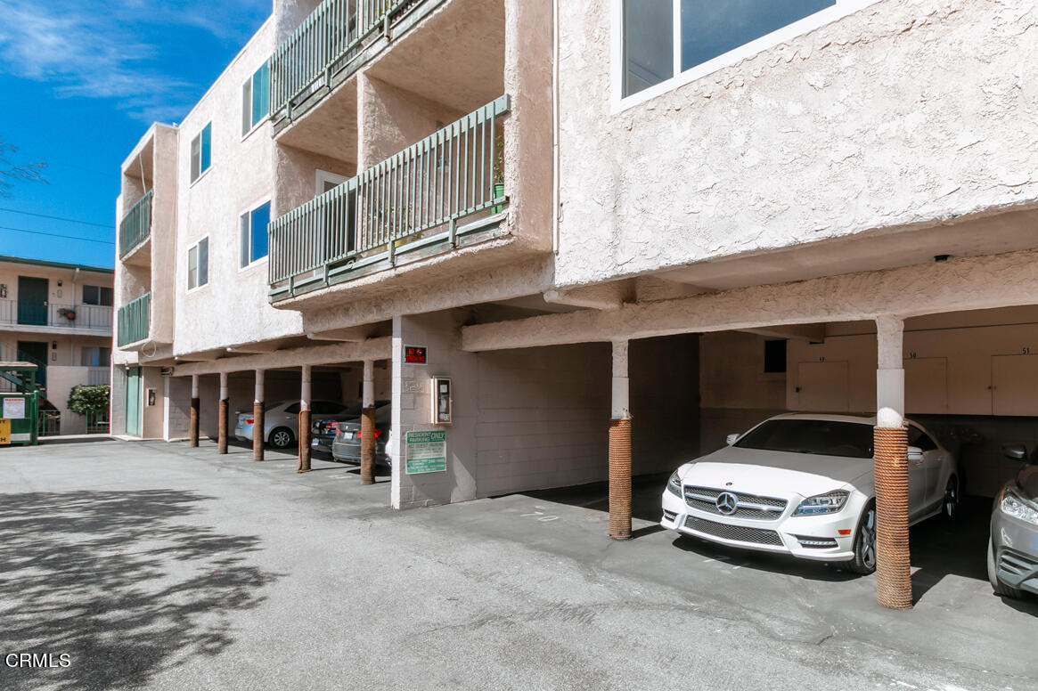 2940 North Verdugo Road, Unit 309 Glendale, CA 91208 - Photo 22 of 26 a car parked in front of a building