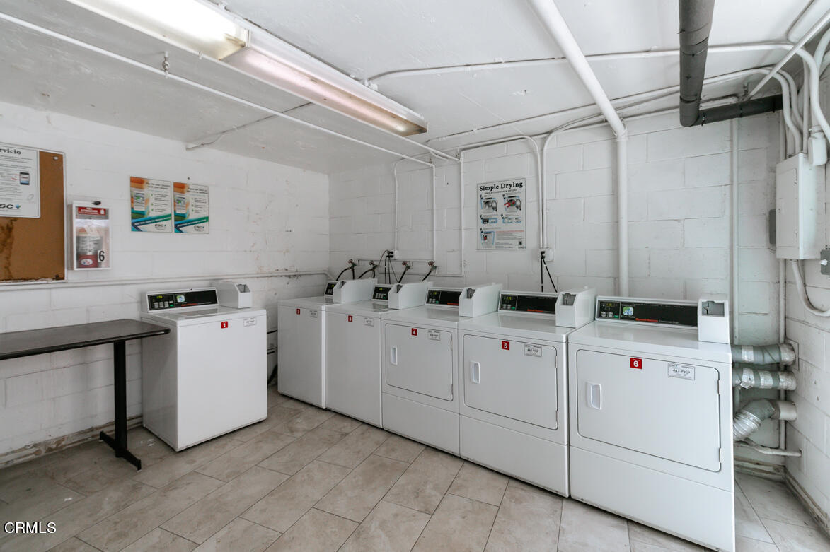 2940 North Verdugo Road, Unit 309 Glendale, CA 91208 - Photo 24 of 26 a utility room with dryer and washer