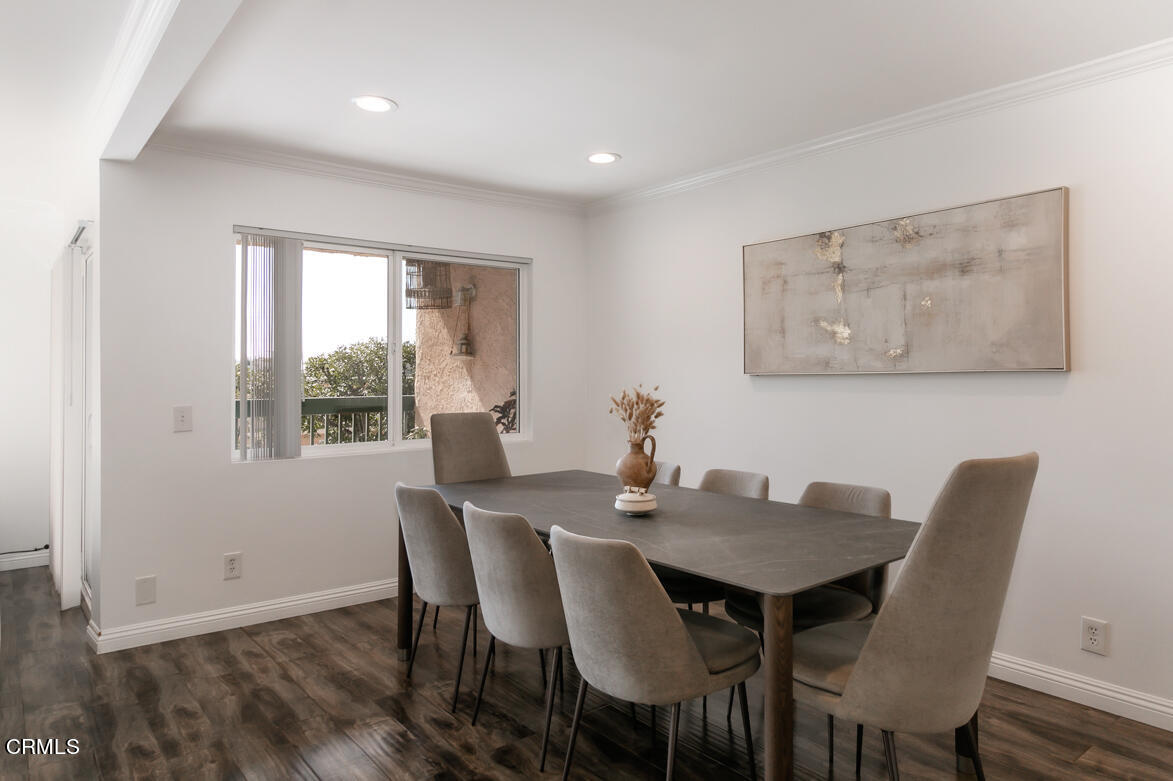 2940 North Verdugo Road, Unit 309 Glendale, CA 91208 - Photo 3 of 26 a view of a dining room with furniture window and wooden floor