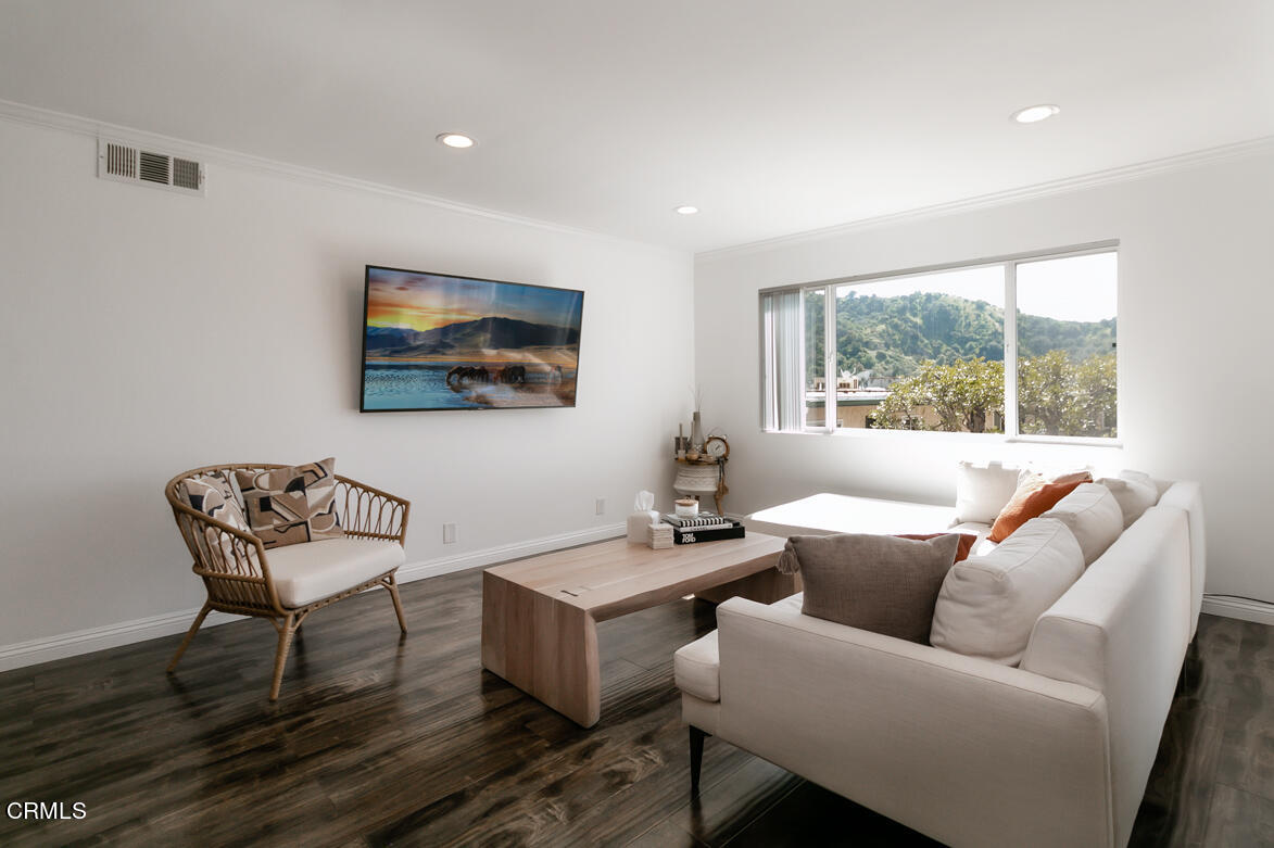 2940 North Verdugo Road, Unit 309 Glendale, CA 91208 - Photo 5 of 26 a living room with furniture and a window