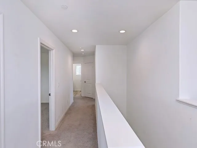 a view of hallway with stairs