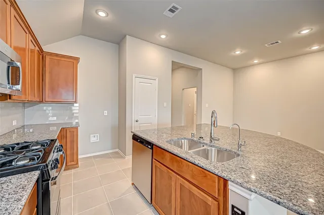 a bathroom with a sink double vanity and a mirror