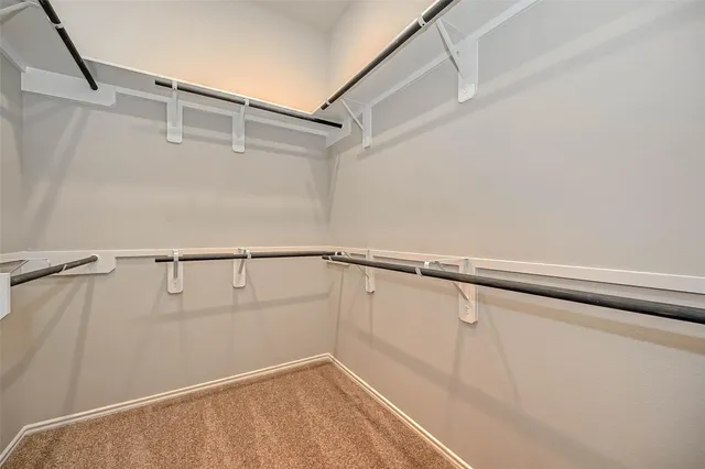 a view of a room with racks on the wall