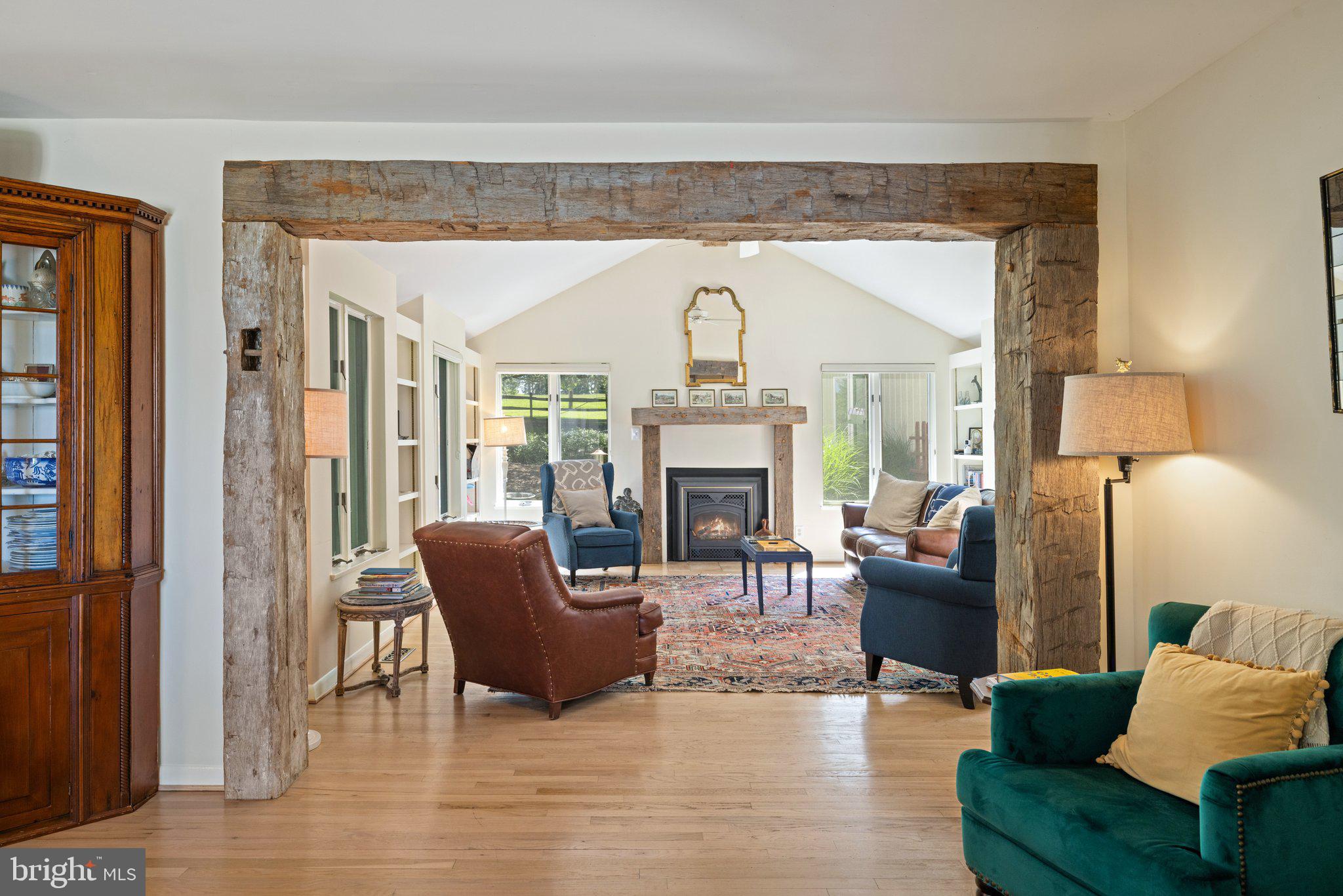 1248 Delaplane Grade Road Upperville, VA 20184 - Photo 4 of 77 Living room with accents of exposed wood