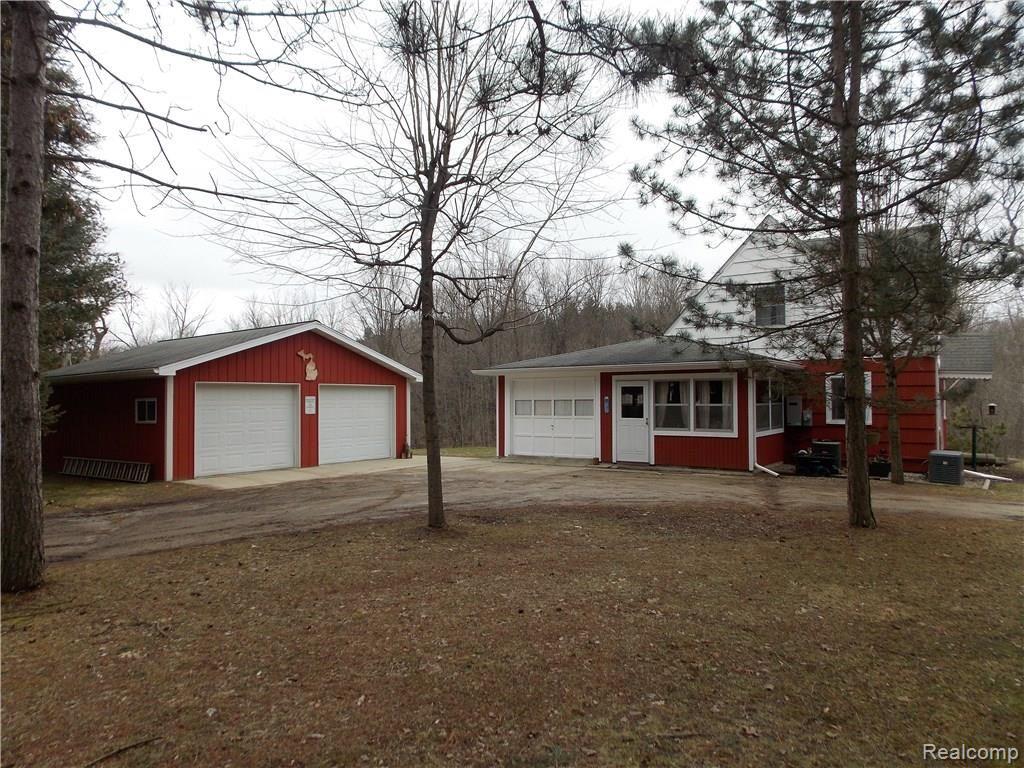 1200 North Maple Leaf Road Lapeer, MI 48446 - Photo 2 of 22 There is a detached 2 car garage and an indoor patio. The home also has a full house propane generator.