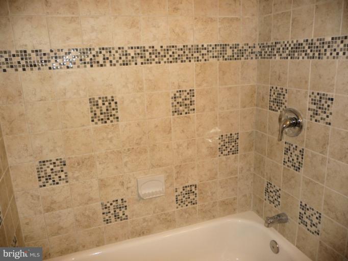5709 Norton Road Alexandria, VA 22303 - Photo 30 of 30 Tiled Tub Surround In Basement