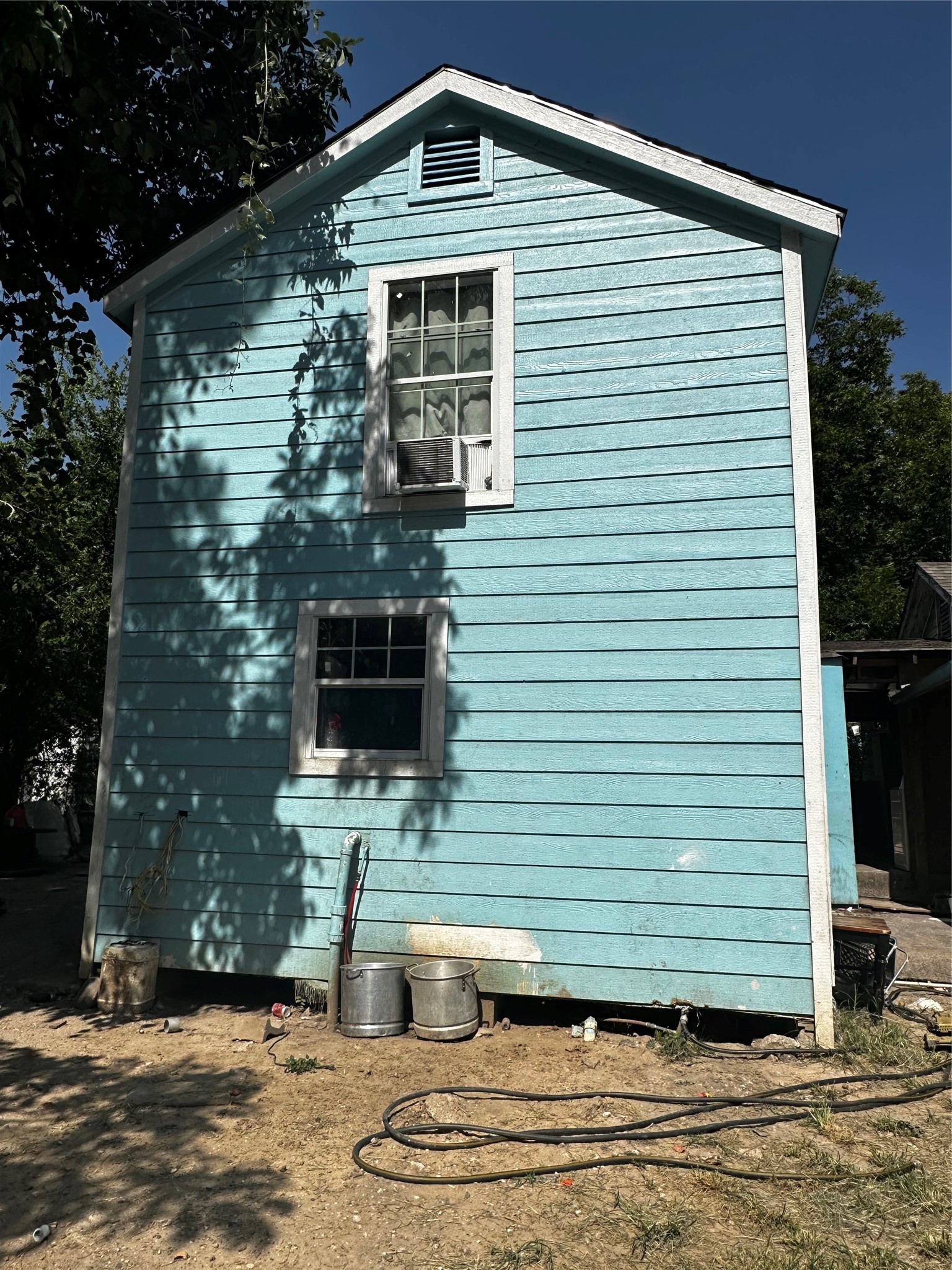 5511 Enid Street Houston, TX 77009 - Photo 2 of 6 a front view of a house with parking