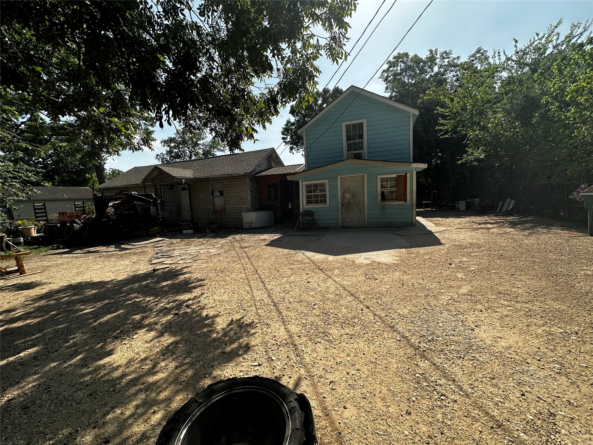 5511 Enid Street Houston, TX 77009 - Photo 3 of 6 a view of a house with a snow in the yard